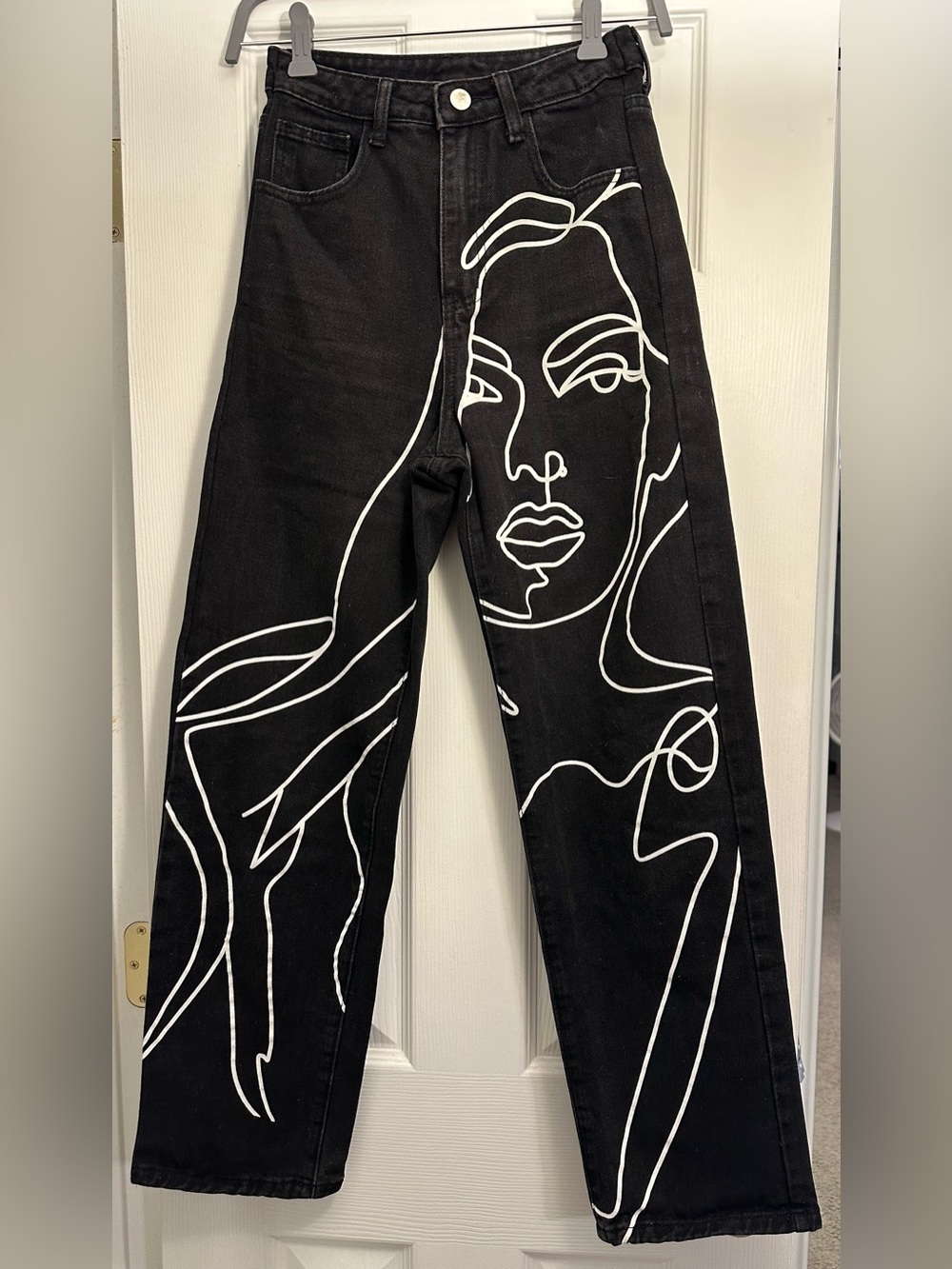 SHEIN XS Black Jeans with White Abstract Face Graphic